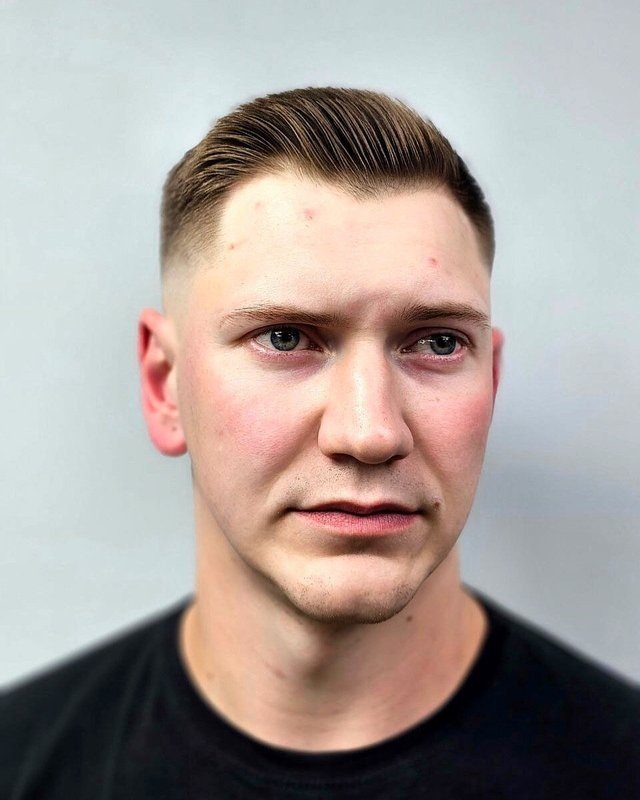 Интерьер барбершопа Мужская парикмахерская Rock BarberShop
